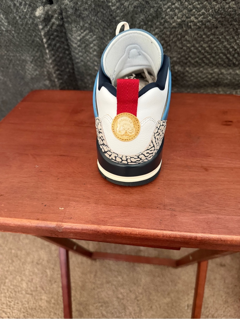 Nike White, Navy and Light Blue Sneaker with Red Heel Pull